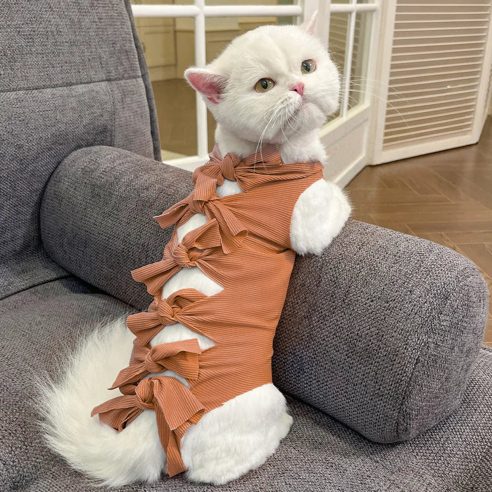 Blue lace-up polyester sterilisation clothing for a cat, shown on a size chart for S, M, and L.
