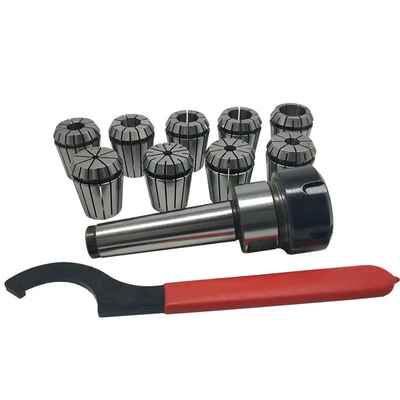 ER32 CNC milling tool set with collets, Morse taper arbor, and wrench on a workbench