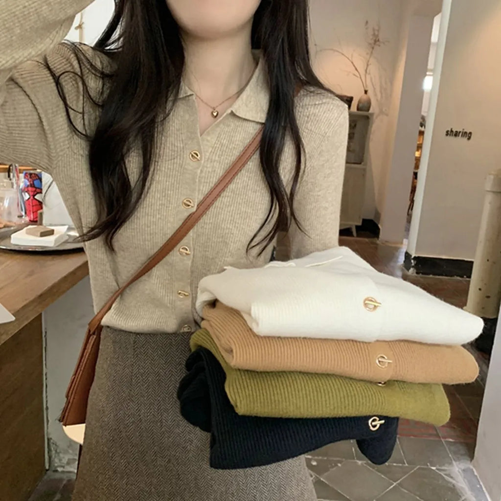 Loose fit long sleeve viscose knitted cardigan in beige, shown worn open.