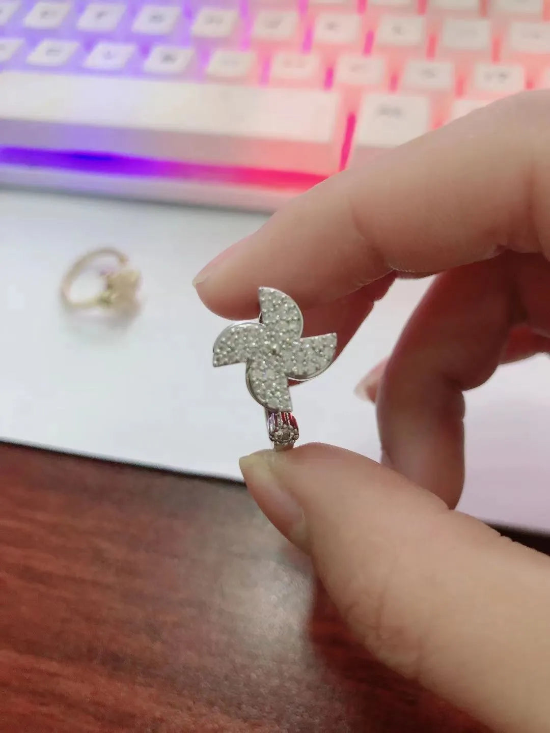 Rotating micro inlaid ring with spinning windmill design in gold or silver finish