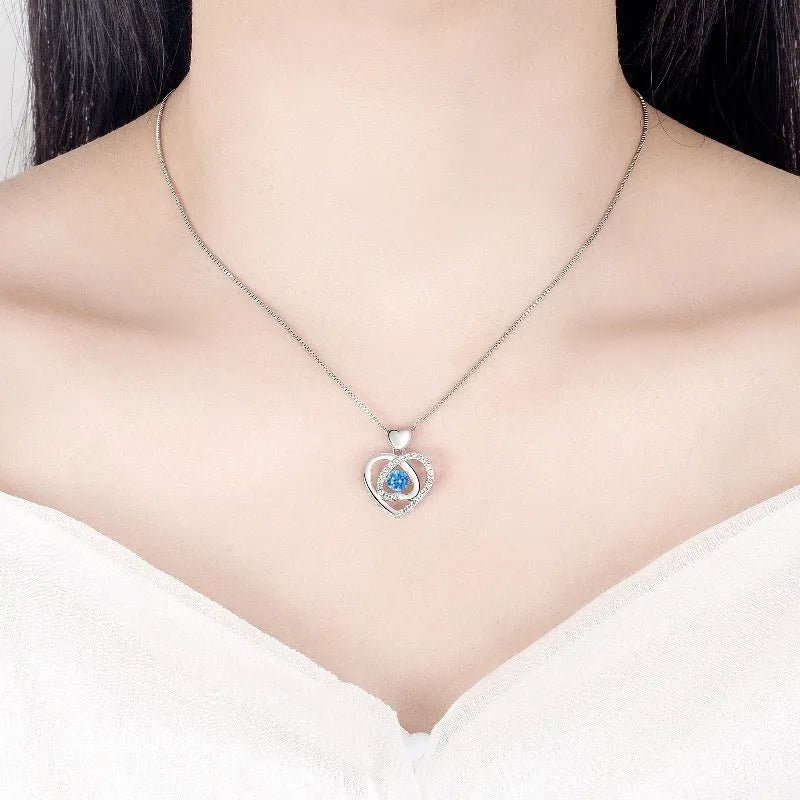 Blue heart necklace and bracelet jewellery set with diamond detailing on copper chains