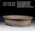 Handmade purple sand ceramic oval bonsai pot measuring 25cm by 21cm