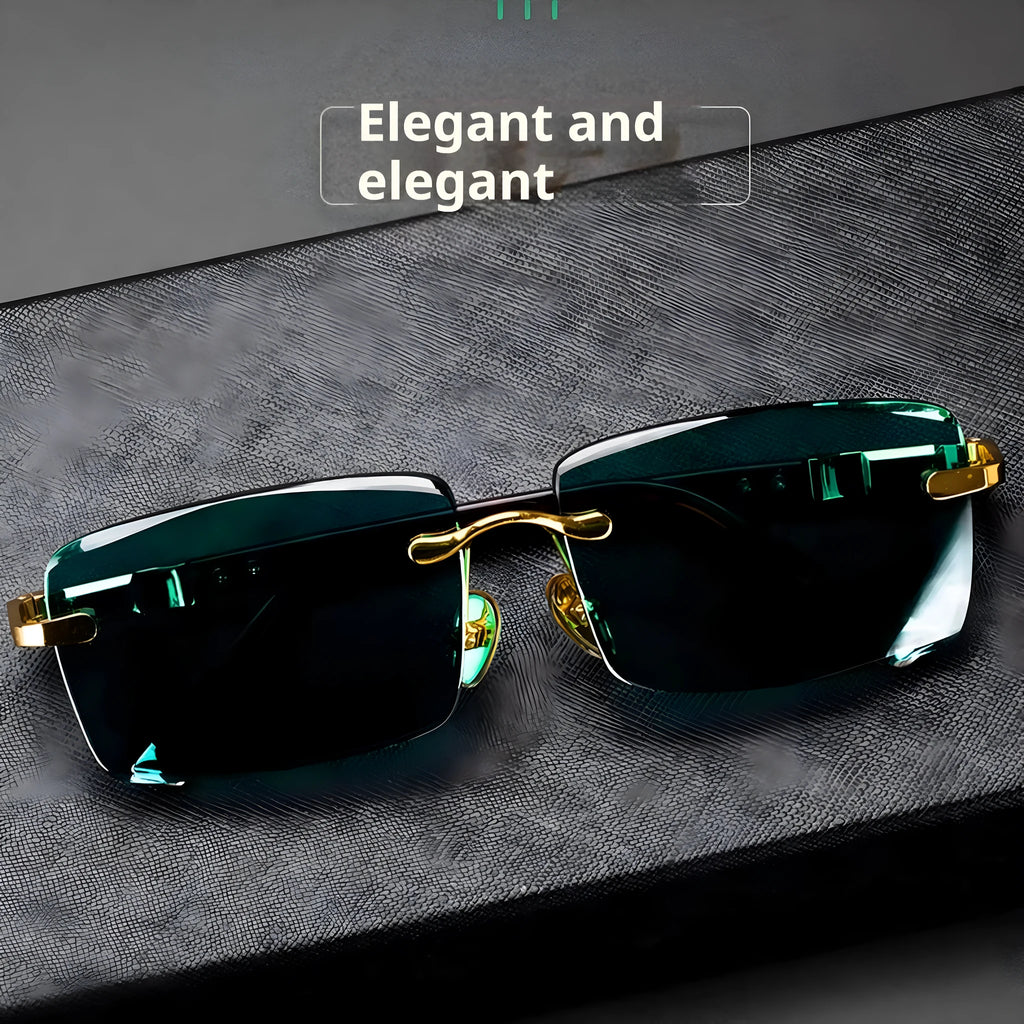 Dark green frameless crystal sunglasses inside a protective case with a lens cloth.