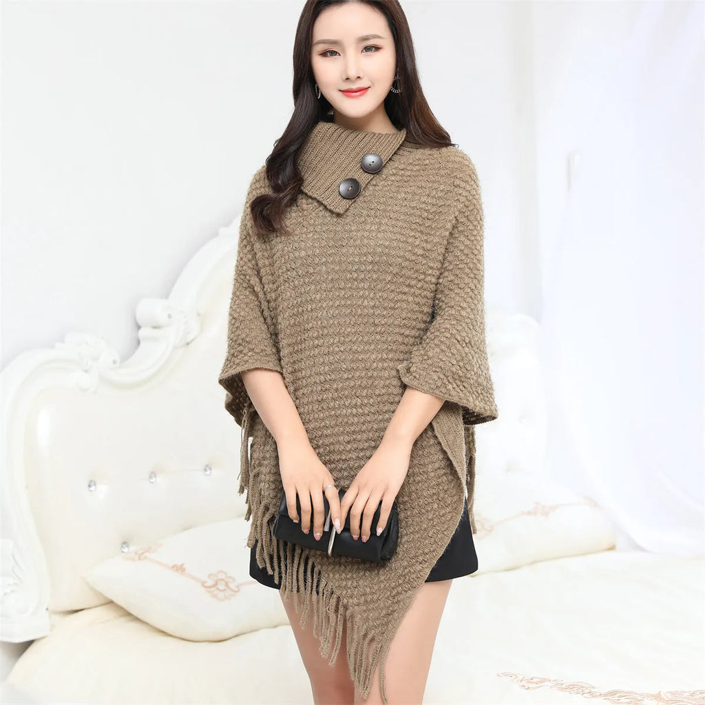 Women's knitted polka dot shawl cloak in sleeveless cape design showing colour options