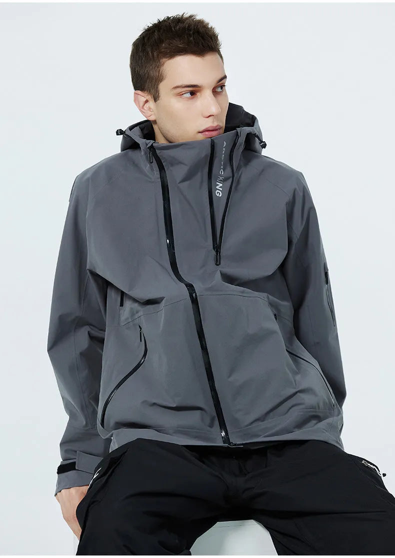 A unisex windproof and waterproof ski suit for snow sports, available in multiple colours.