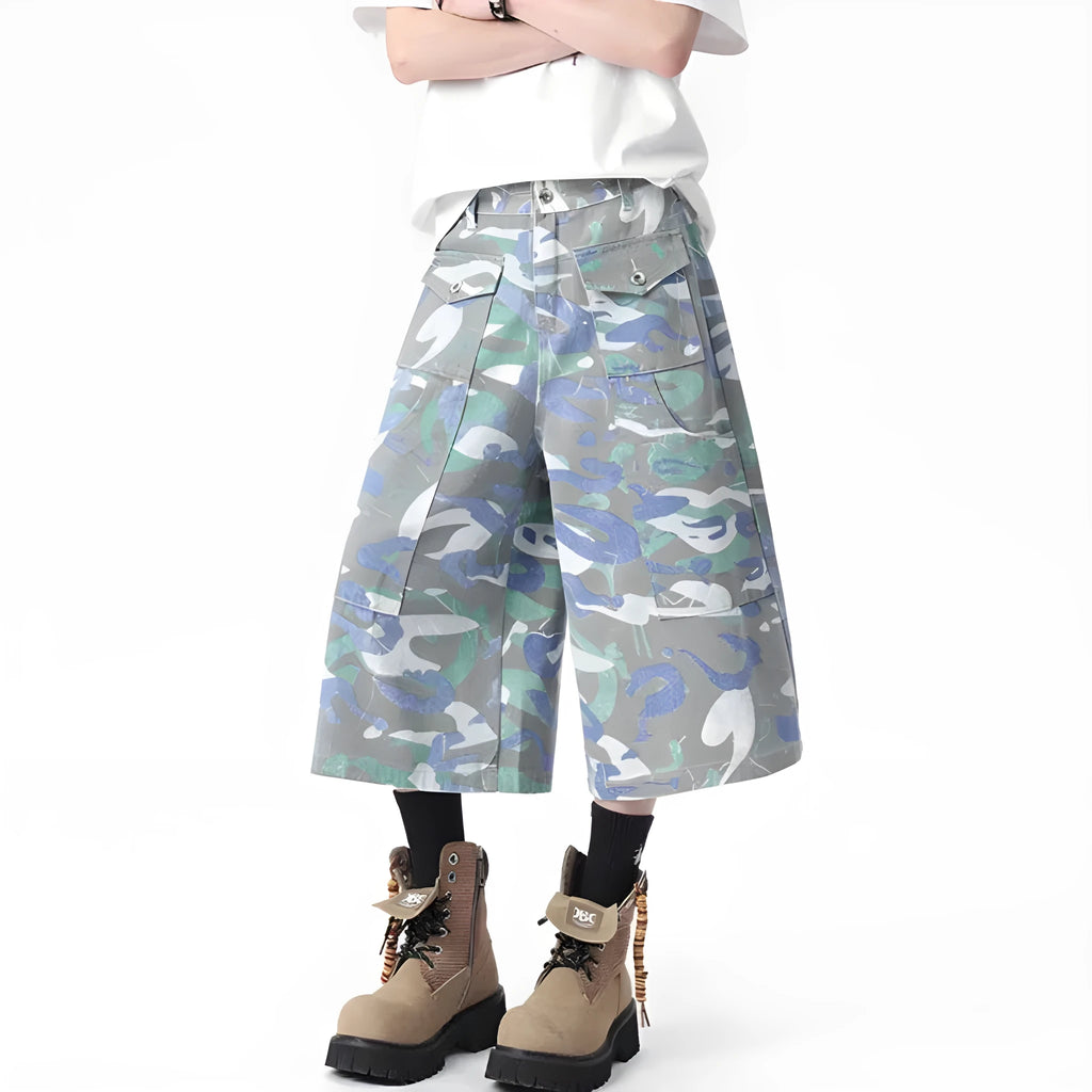 Cropped camouflage denim work trousers with straight leg cut and zipper fly closure
