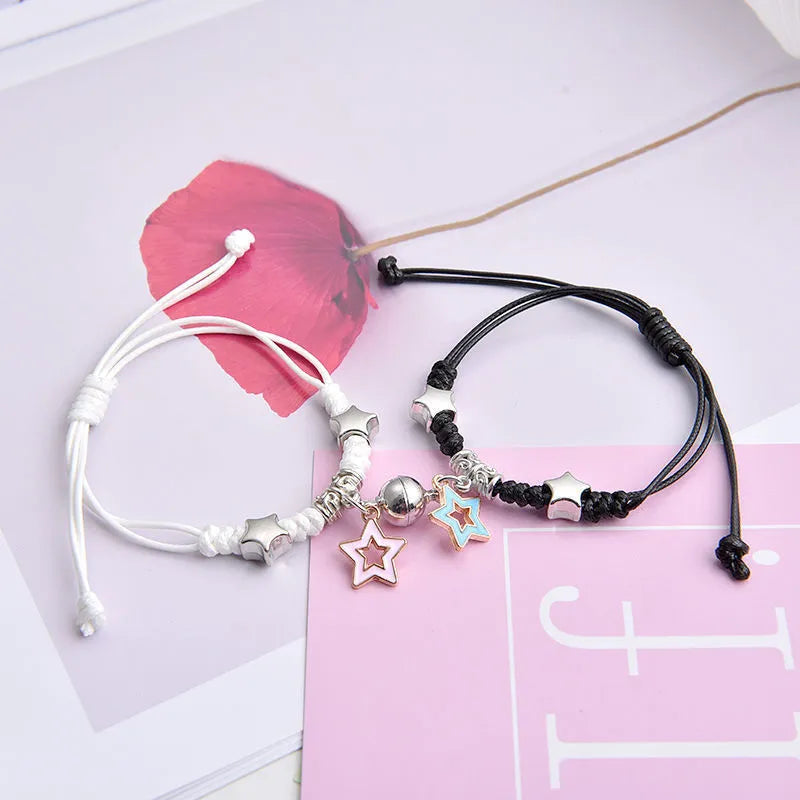 Magnet couple bracelets with electroplated finish showing magnetic clasp and symbolic design options