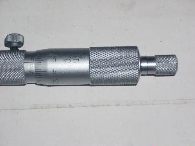 Alloy depth micrometer tool with a 0-100mm measuring range for precision engineering.