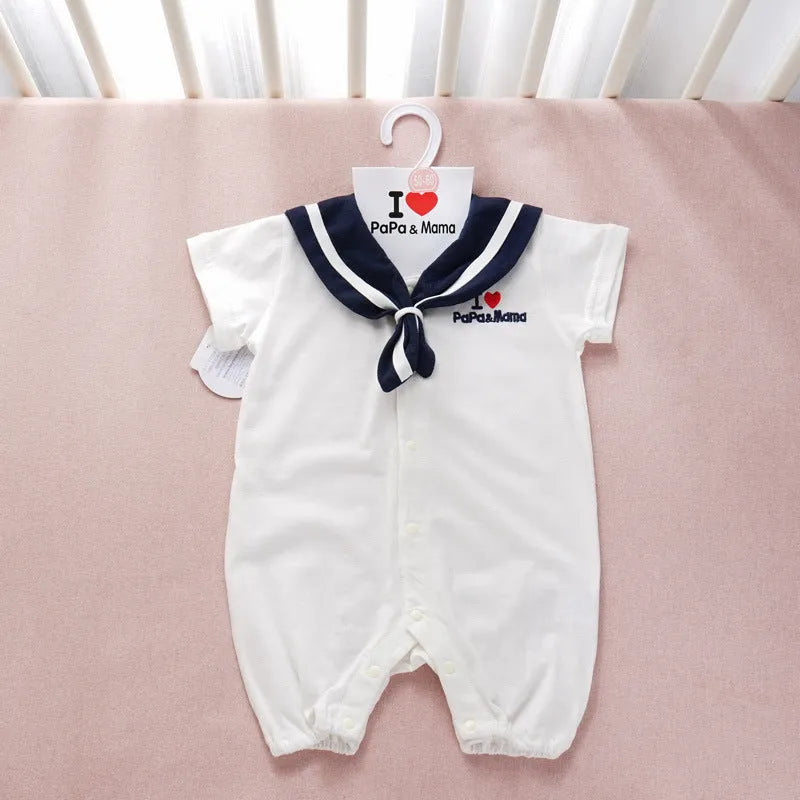 Navy cotton baby onesie with long sleeves and detachable hood on white background