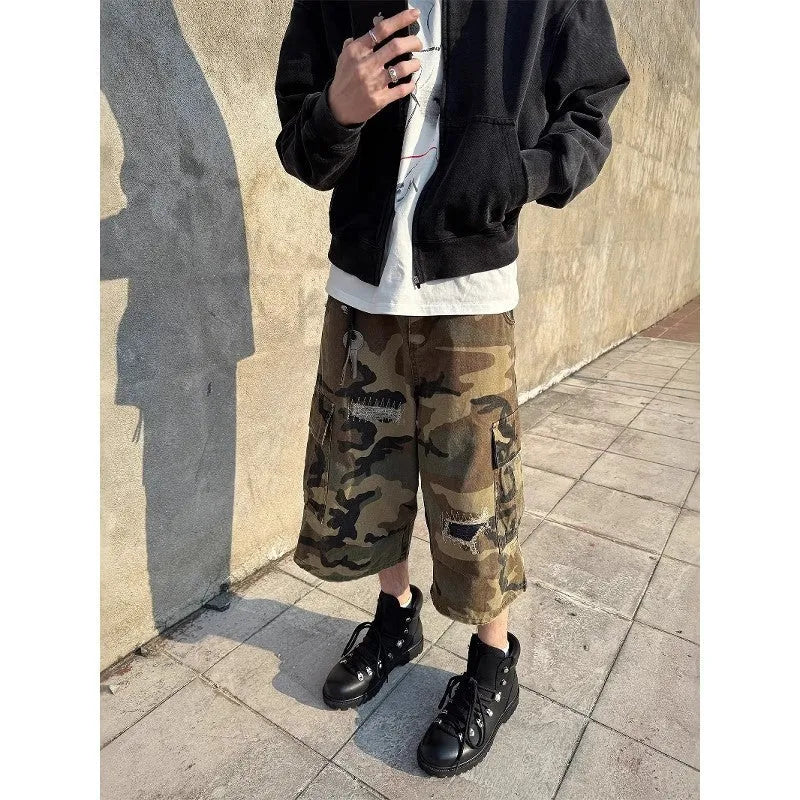 Men's camouflage cropped jeans with patch ripped detailing and loose straight-leg cut