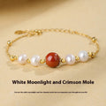Yellow retro-style bracelet with red bean and cinnabar design on 925 silver band.