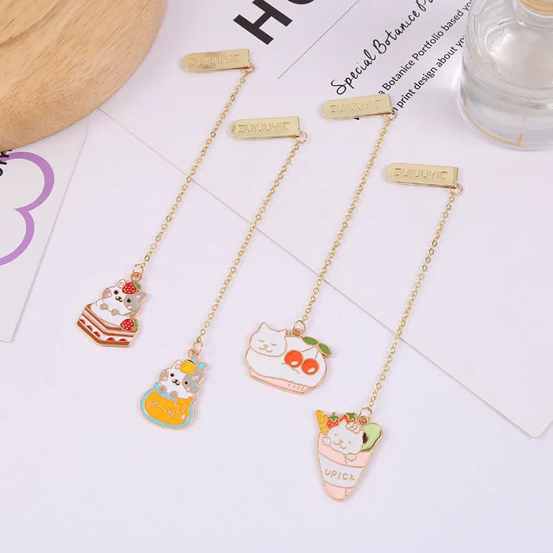 Jane Key Foodie metal bookmark with cartoon cat design, showing four style options including Strawberry Cake Cat.