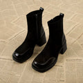 Thick bottom chunky heel Martin boots for women in black with lace-up fastening and rubber sole