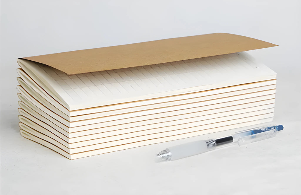 Cowhide diary refill inner core showing saddle stitch binding and 100g ivory white paper