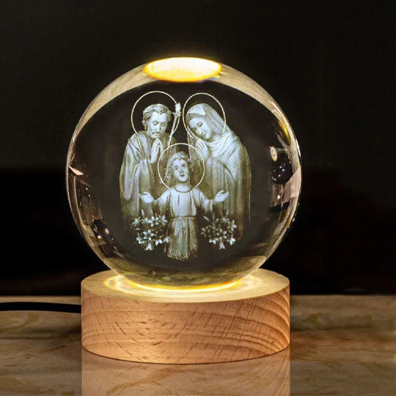 White crystal ball desk ornament with wood base and religious design inside