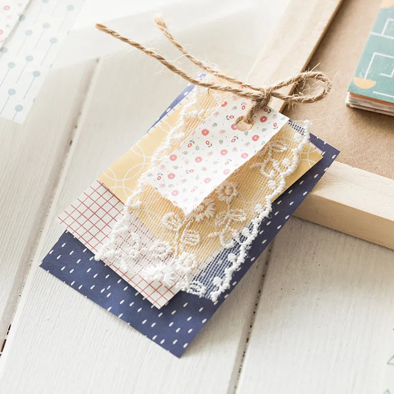 Pack of 50 retro collage material note papers in dessert colours like red plum and caramel, each sheet 56mm by 83mm.