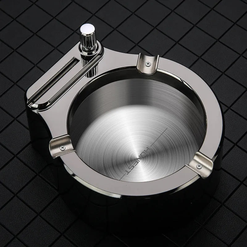 Large blue metal ashtray with integrated permanent match lighter and three cigarette slots.