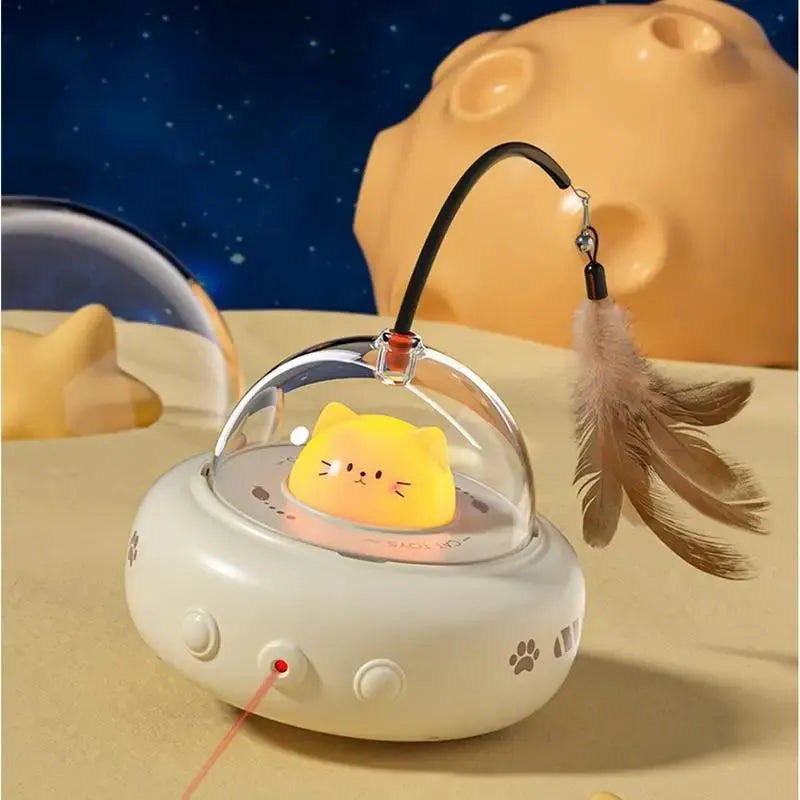 Electric cat interactive toy with pink feather wand and red light beam on a white floor