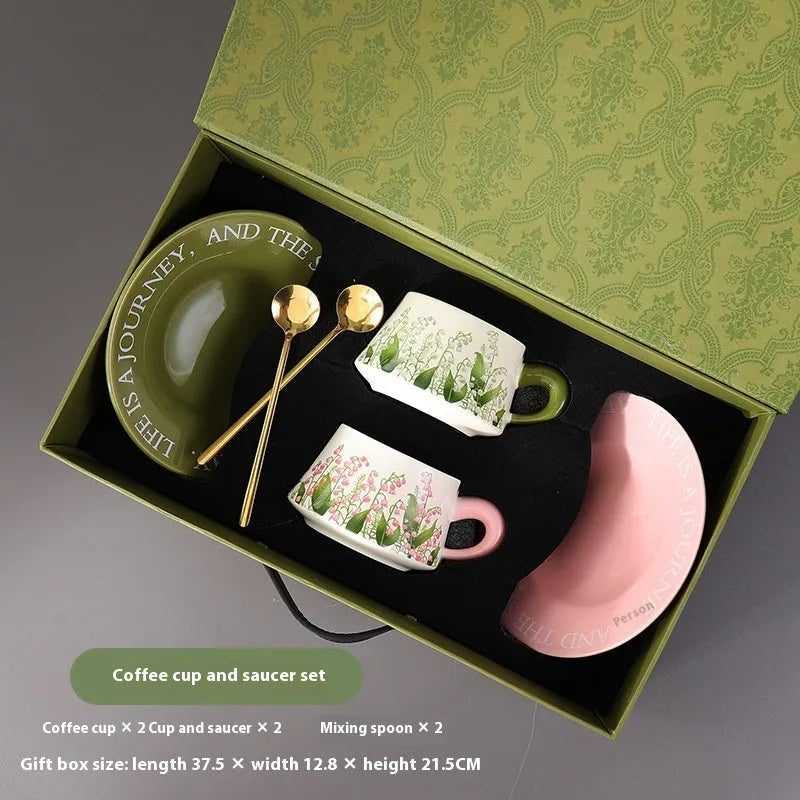 Ceramic coffee cup set with two 300ml cups, saucers, and spoons in couple designs