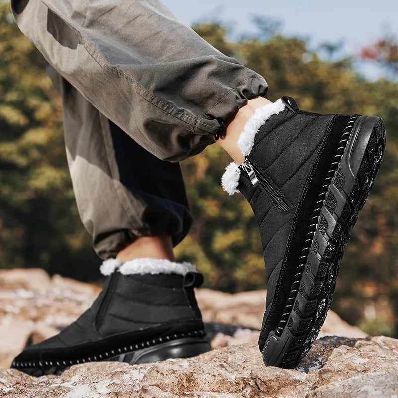 Men's plus size snow boots in black with round toe design and non-slip rubber sole