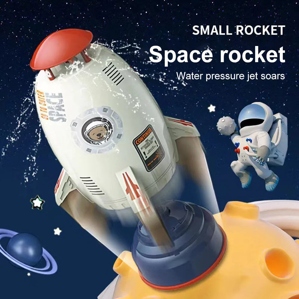 Water pressure powered rocket launcher toy with rotating sprinkler for outdoor garden use