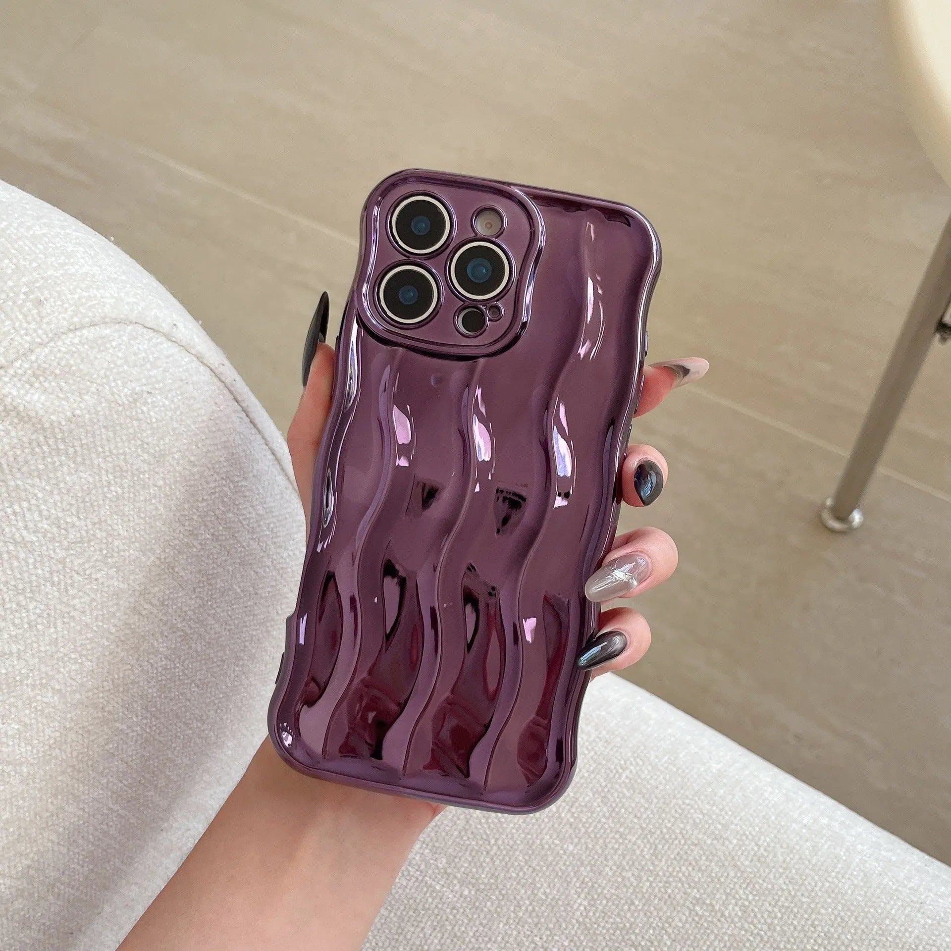 Electroplated wave stripe protective back cover case for iPhone 17 in various colours.