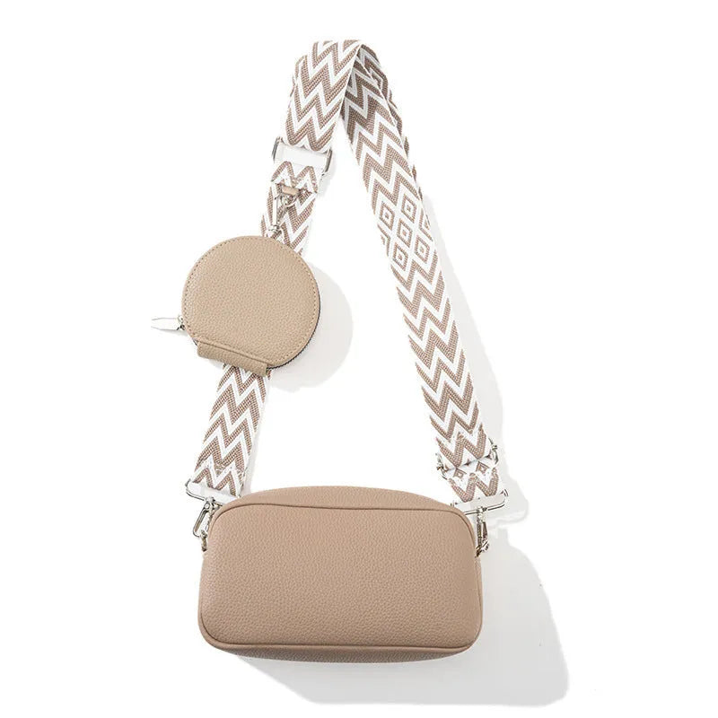Soft black PU crossbody bag for women with a single shoulder strap and decorative sewing thread details.