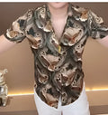 Men's abstract print shirt with button front and long sleeves in multiple sizes