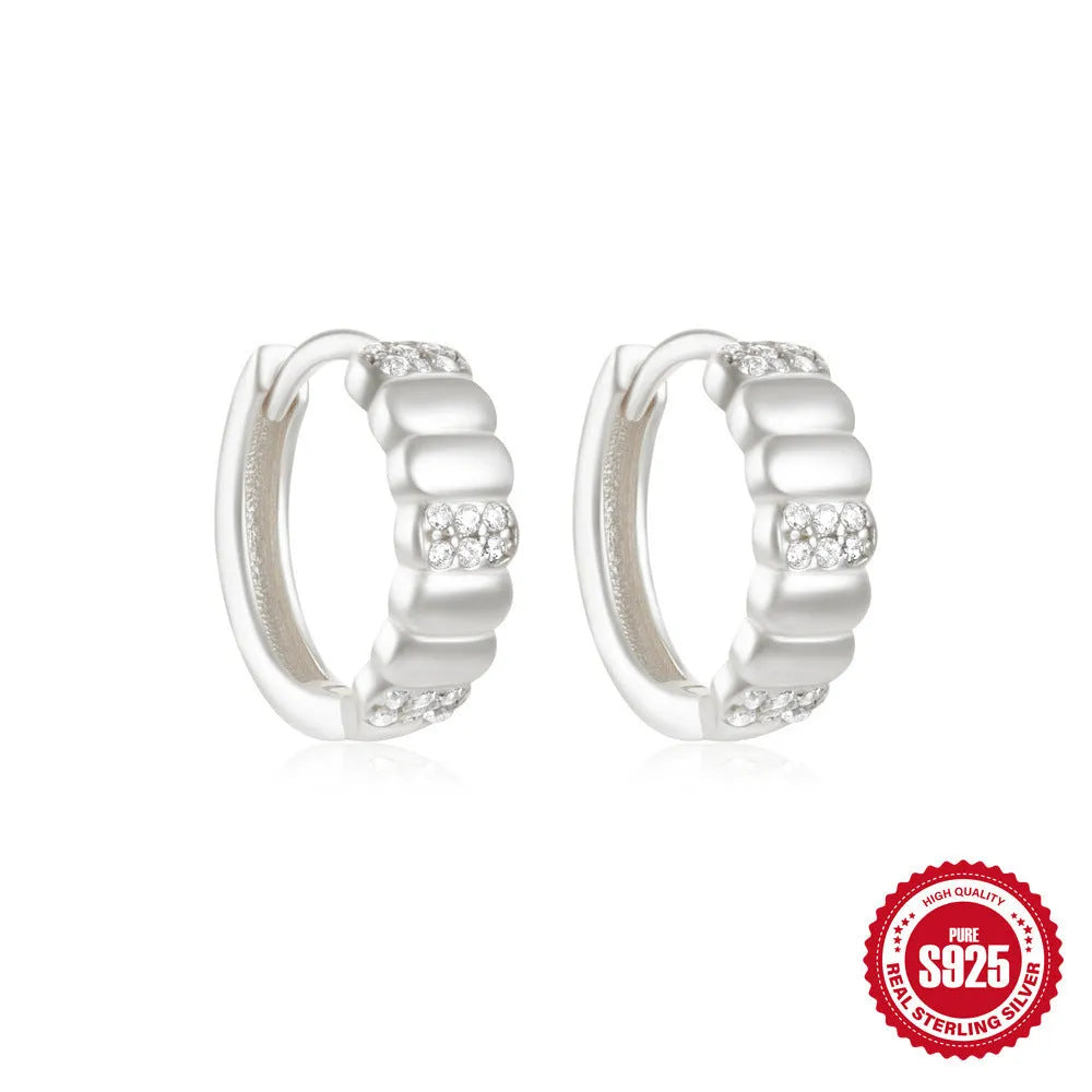 Small round geometric sterling silver stud earrings with diamond accents in gold or silver finish