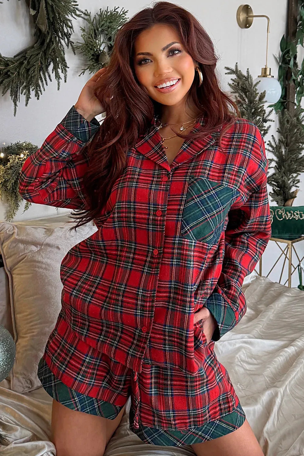 Red plaid Christmas pyjama set with long sleeve shirt and shorts featuring contrast patch details