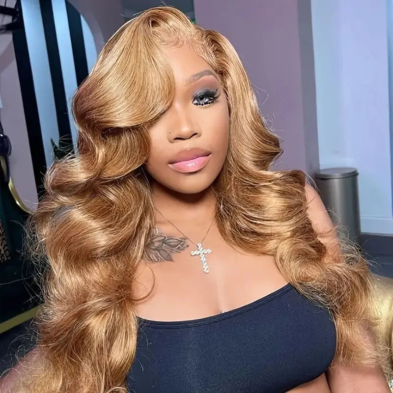 Light brown long synthetic curly wig with big waves and side bangs shown at medium length