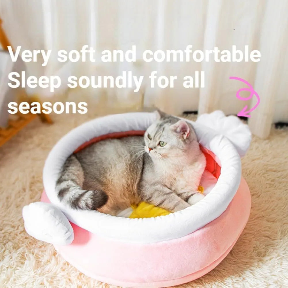 Pink honey pot shaped cat bed with a removable circular cushion inside for a small pet.