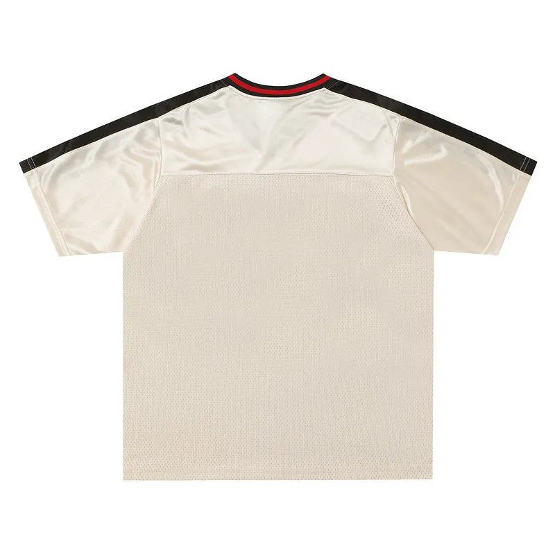 Apricot coloured V-neck couple tops with printed letters and drop-shoulder sleeves