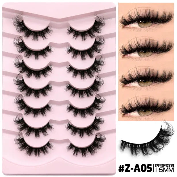 Box of natural style false eyelashes made from artificial fibre, showing thick dense lashes.