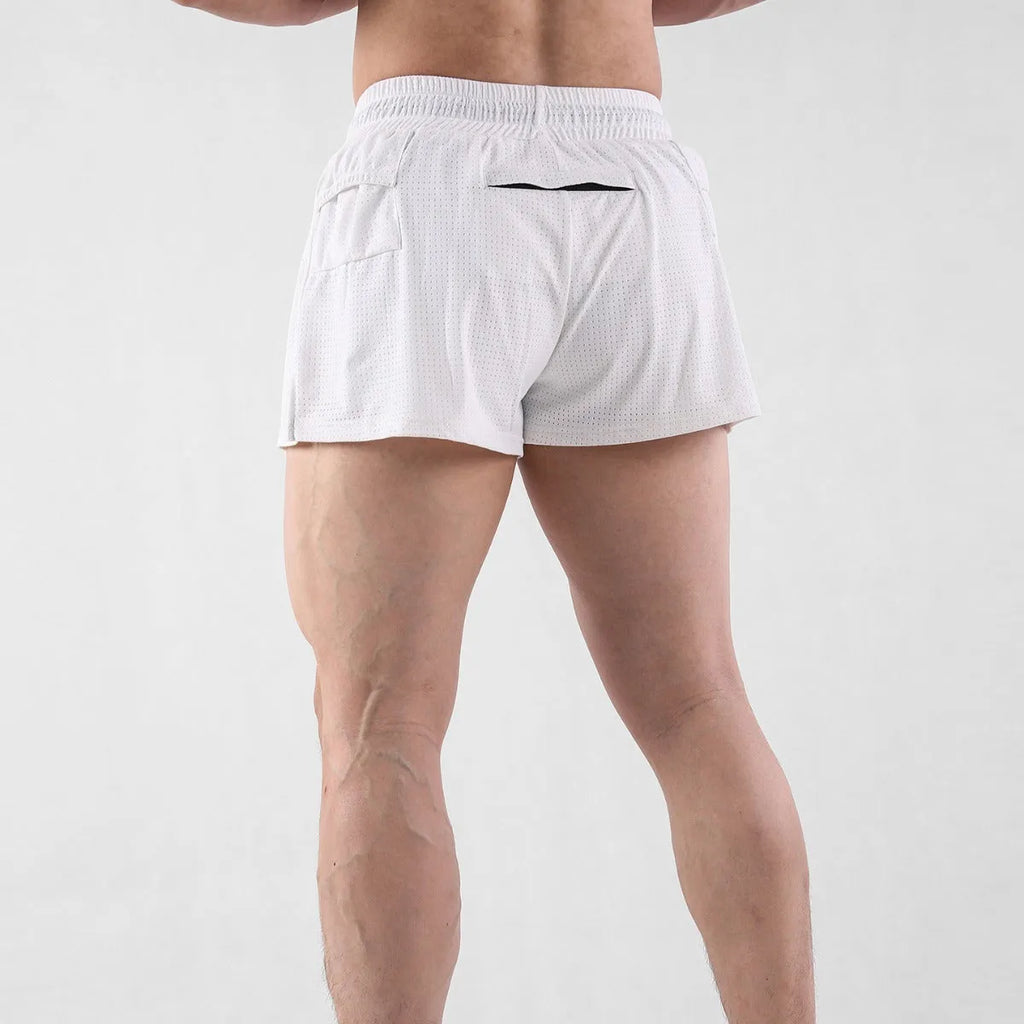 Men's black quick-drying nylon summer shorts on a mid-waist fit model.