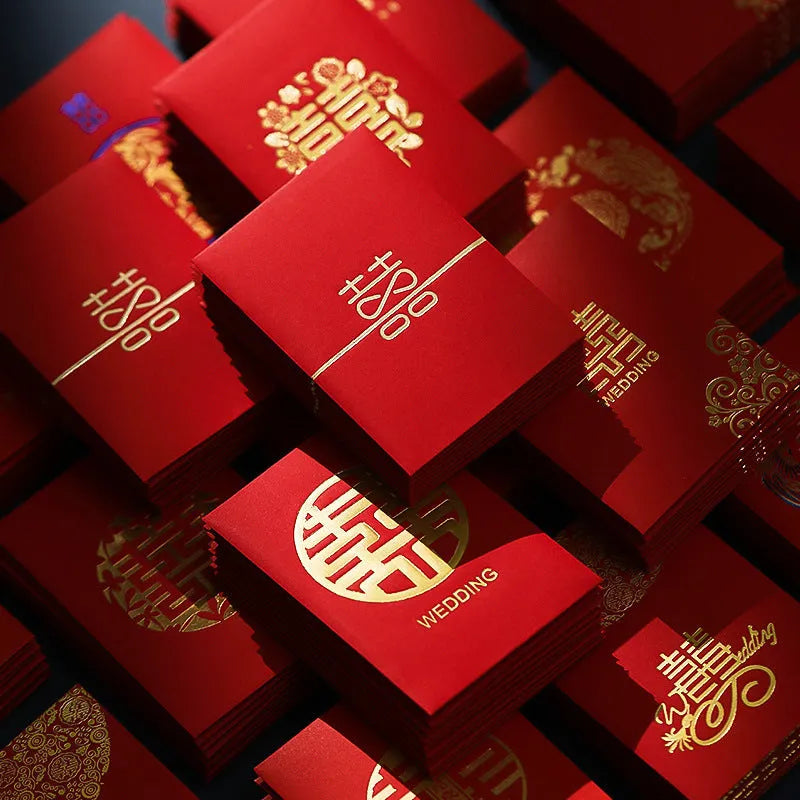 Pack of mini Chinese style wedding red packets in various colours for small cash gifts