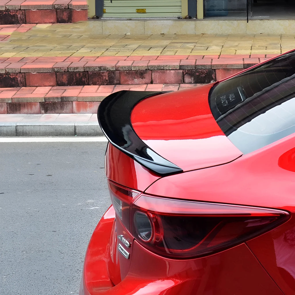 Mazda 3 Exela tail trim blade in bright black finish for 2014-2021 models