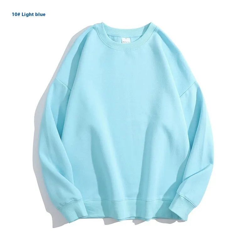 Cotton off shoulder pullover sweater in a loose fit, shown in a solid colour with long sleeves.