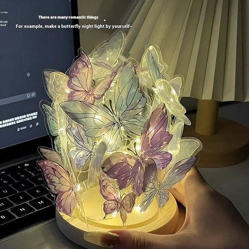 Handmade butterfly night lamp with glass shade on raw wood base measuring 12x15cm