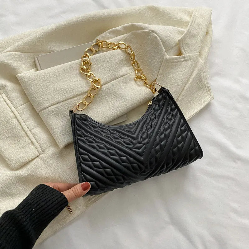 Brown PU pleated chain baguette shoulder bag showing vertical square shape and soft carry handle.