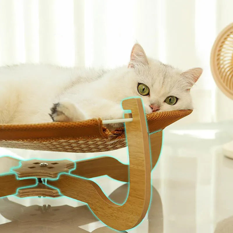 Brown woven rattan off-ground hammock bed for cats and small dogs.