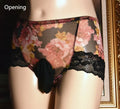 Men's mid-waist ice silk ultra-thin mesh briefs in black, showing front view with elastic waistband