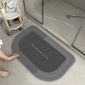 Blended fabric bathroom floor mat in blue, available in oval and rectangular shapes.
