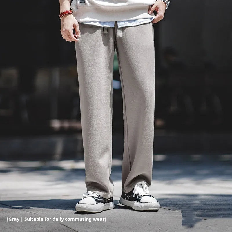 Men's casual air layer sweatpants in gray polyester, loose straight-leg elastic waist design