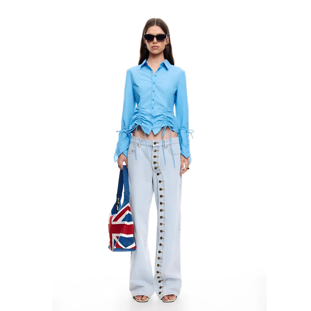 Women's straight-leg multi-button low-waist jeans in blue stone-washed cotton denim, side view