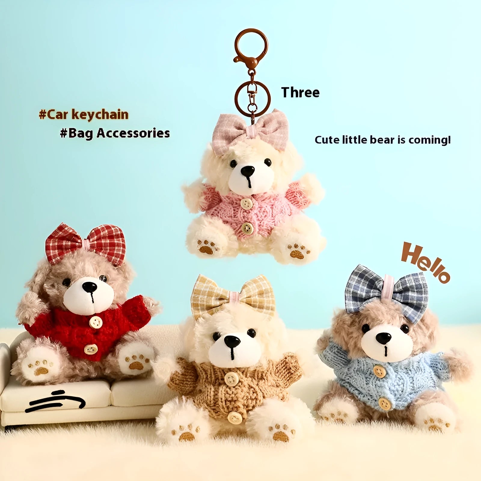 Plush biscuit bear keychain pendant with a red bow on a metal keyring
