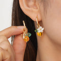 Sweet alloy and glass bee pendant ear cuff with flower and leaf motifs for women