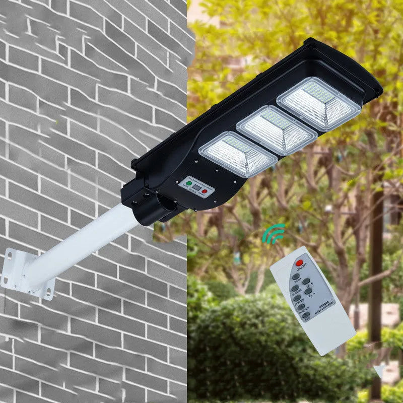Integrated solar street light with solar panel, 60W LED lighting, and remote control for outdoor use
