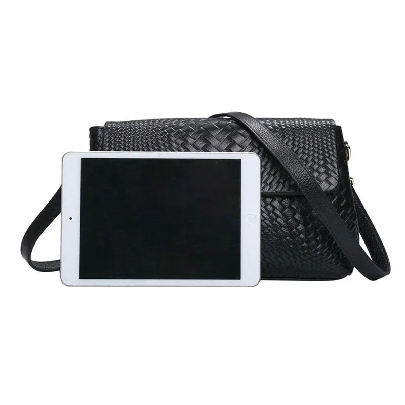 Genuine leather women's woven crossbody bag in black with embossed finish and soft handle