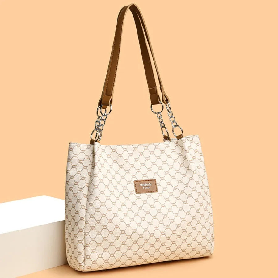 Women's retro style handbag in soft PU leather with polyester lining, shown in brown colour